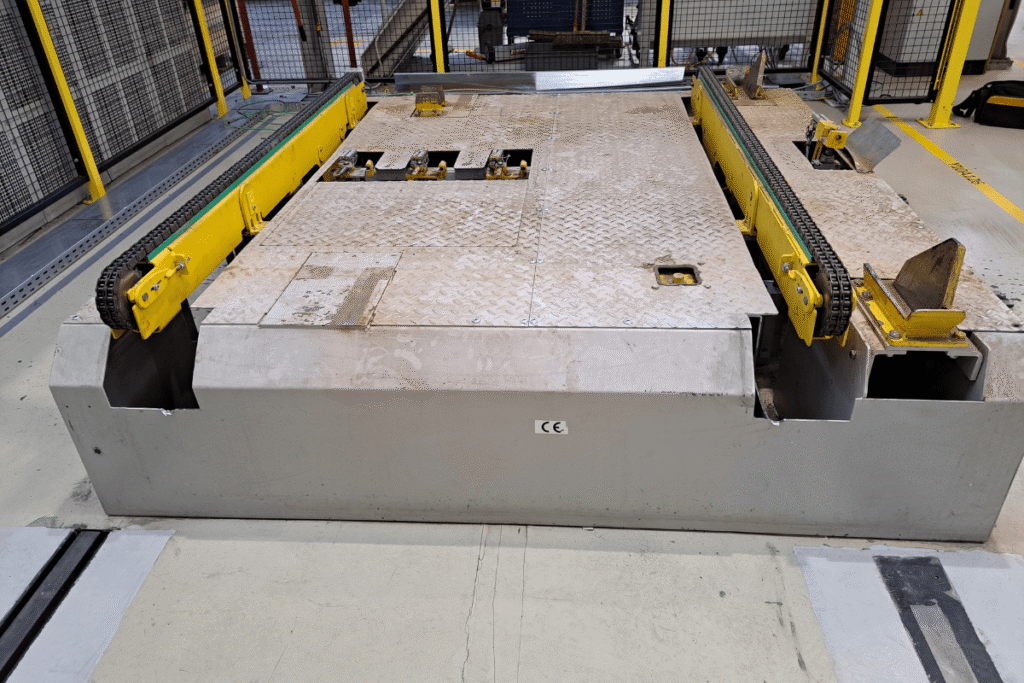 afvoeren van cabinepallets vanaf de bestaande ontgrendelbok