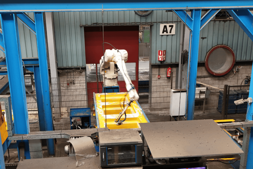 Robot voor het olien van mallen, prefab beton fabriek